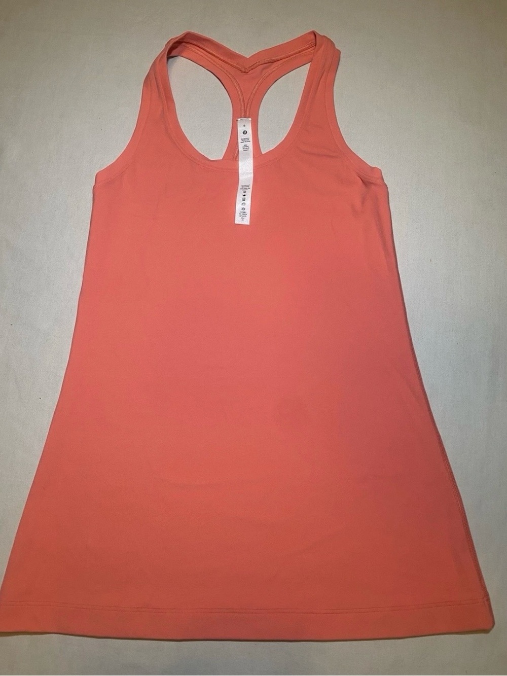lululemon athletica Coral
Racerback Tank Top Size 6 Nylon
Lycra Stretch
#0003